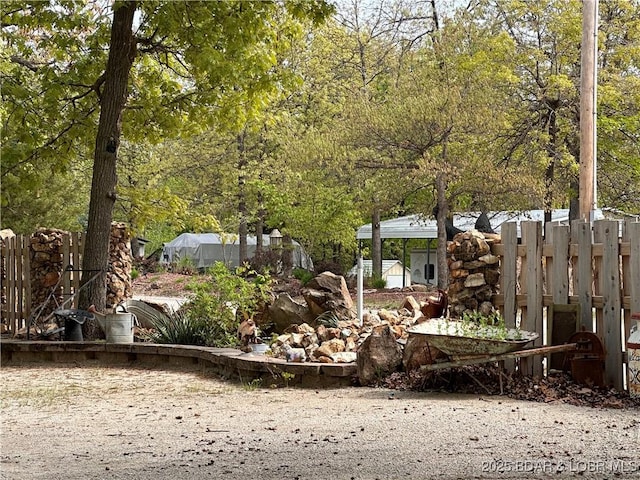 view of yard with fence