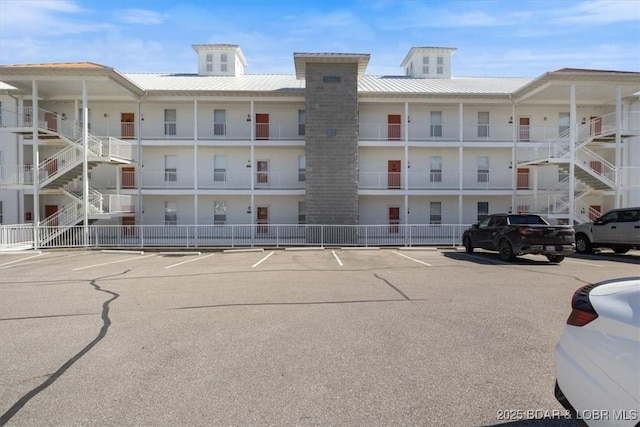 62 Knox Rd Unit 503, Rocky Mount, MO 65072 - view of property featuring uncovered parking