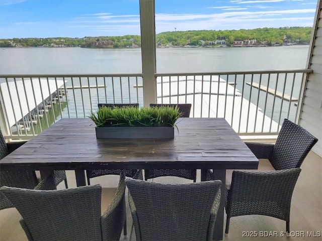 62 Knox Rd Unit 503, Rocky Mount, MO 65072 - balcony with outdoor dining area and a water view