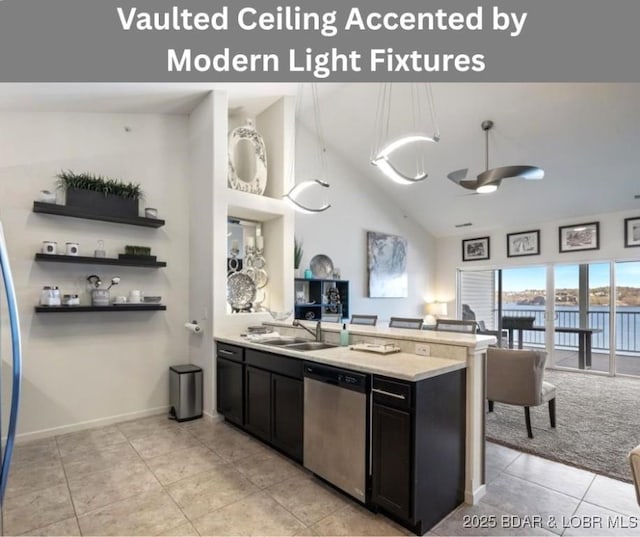 62 Knox Rd Unit 503, Rocky Mount, MO 65072 - kitchen featuring stainless steel dishwasher, a peninsula, dark cabinets, a sink, and light tile patterned floors