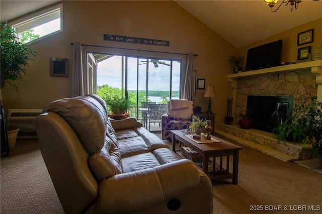 362 Hopetown Dr, Osage Beach, MO 65065 - living area with a stone fireplace, carpet flooring, a wealth of natural light, and high vaulted ceiling