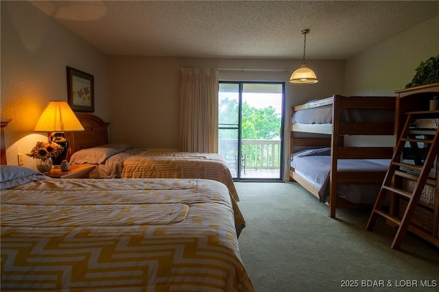 362 Hopetown Dr, Osage Beach, MO 65065 - bedroom with a textured ceiling, carpet, and access to exterior
