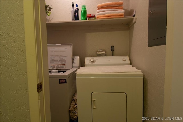 362 Hopetown Dr, Osage Beach, MO 65065 - clothes washing area featuring laundry area, a textured wall, and washer and dryer