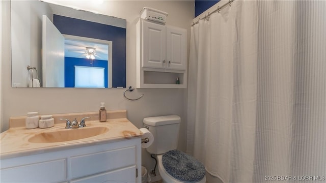 783 Winn Rd Unit 5F, Osage Beach, MO 65065 - bathroom with vanity, ceiling fan, and toilet