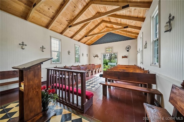 interior space with wooden ceiling, wood-type flooring, and vaulted ceiling with beams