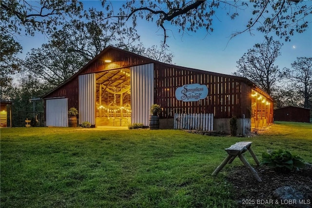 129 Vaughan Rd, Eldon, MO 65026 - view of pole building featuring a lawn