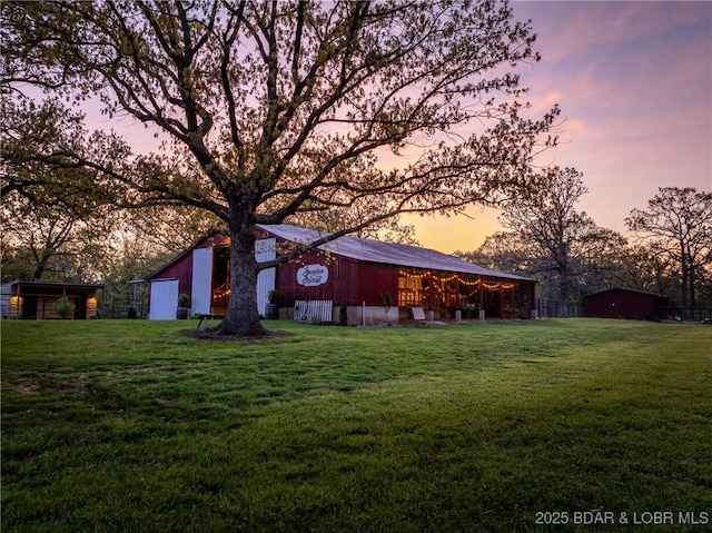 129 Vaughan Rd, Eldon, MO 65026 - view of grassy yard with an outbuilding