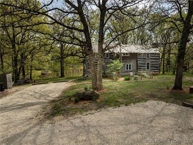 129 Vaughan Rd, Eldon, MO 65026 - view of front of home with metal roof