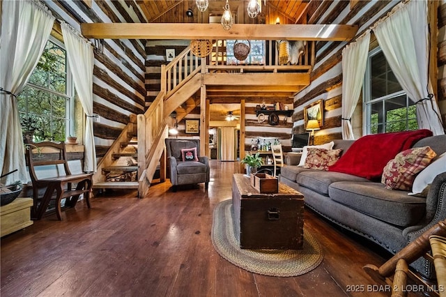 129 Vaughan Rd, Eldon, MO 65026 - lobby with high vaulted ceiling, stairs, wood walls, and wooden ceiling with exposed beams