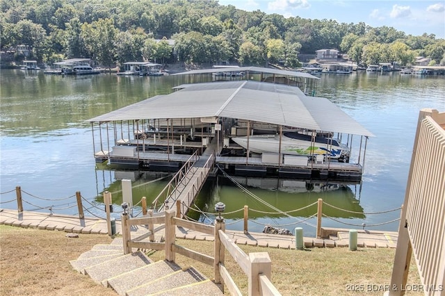 dock area featuring a water view and boat lift