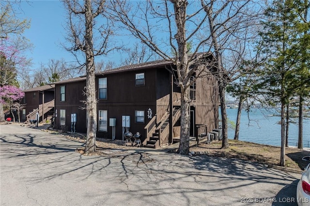 256 Lone Oak Pt Unit 15, Sunrise Beach, MO 65079 - exterior space featuring a water view and stairs