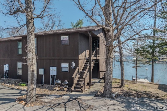 256 Lone Oak Pt Unit 15, Sunrise Beach, MO 65079 - exterior space with stairway and a water view