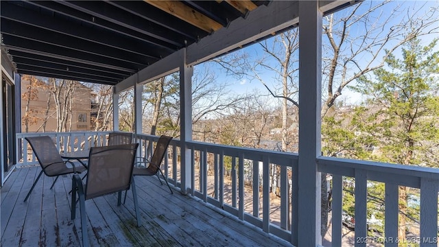 deck featuring outdoor dining area