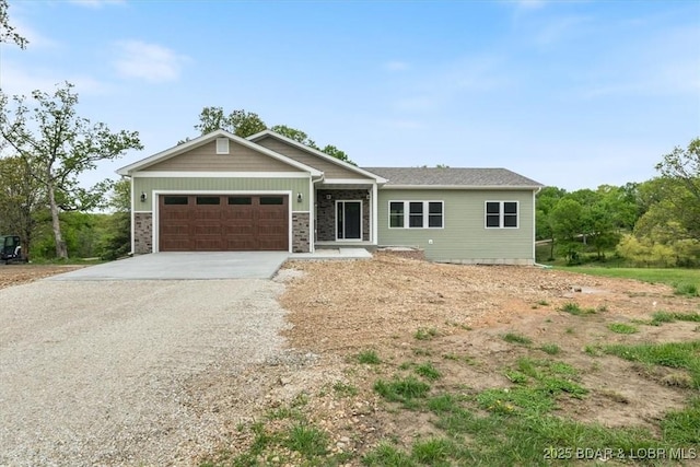21 Meadow Lake Cir, Eldon, MO 65026 - view of front of house with concrete driveway and an attached garage