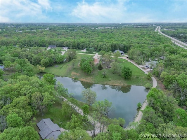21 Meadow Lake Cir, Eldon, MO 65026 - aerial view of property's location with a nearby body of water and a forest