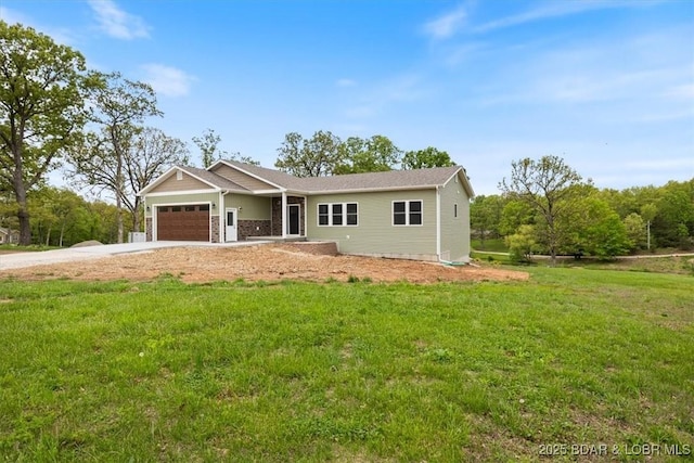21 Meadow Lake Cir, Eldon, MO 65026 - view of front facade with an attached garage, a front lawn, and driveway