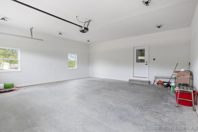 21 Meadow Lake Cir, Eldon, MO 65026 - garage featuring a garage door opener