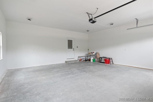 21 Meadow Lake Cir, Eldon, MO 65026 - garage featuring a garage door opener