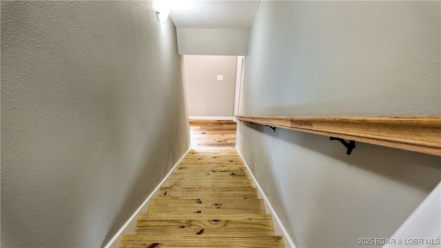 21 Meadow Lake Cir, Eldon, MO 65026 - hall featuring light wood-style floors, baseboards, and a textured wall