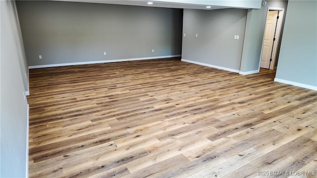 21 Meadow Lake Cir, Eldon, MO 65026 - unfurnished room featuring baseboards, recessed lighting, and wood finished floors
