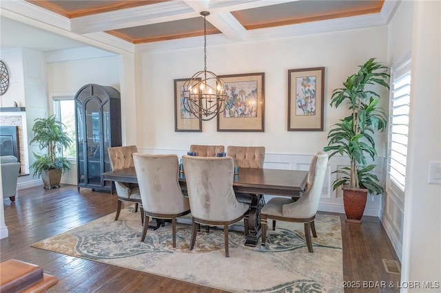 1484 Apple Blossom Cir, Osage Beach, MO 65065 - dining space with coffered ceiling, wood-type flooring, beamed ceiling, a chandelier, and ornamental molding
