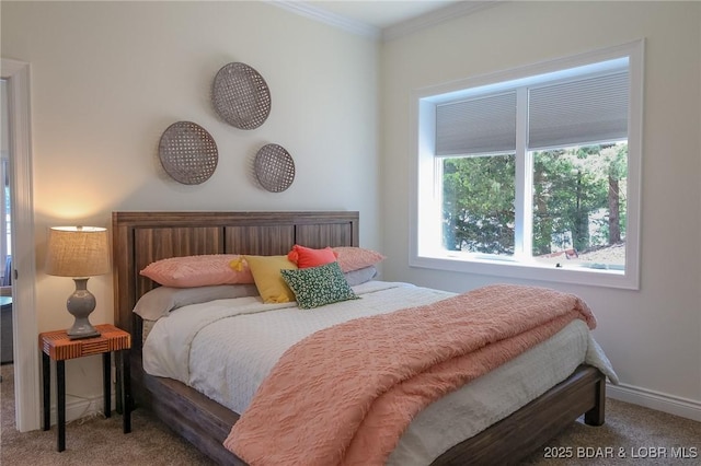 bedroom with carpet floors, ornamental molding, and baseboards