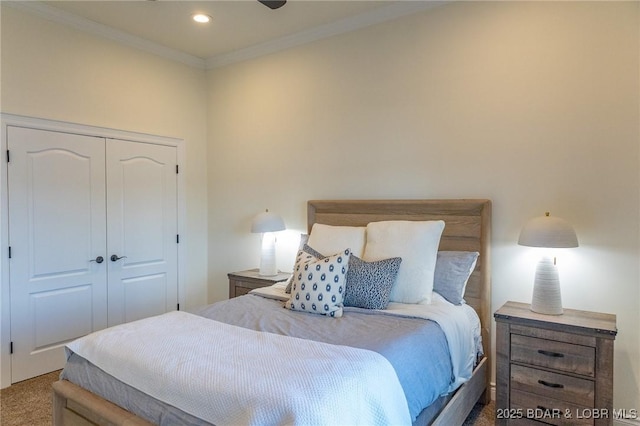 bedroom with a closet, carpet flooring, recessed lighting, and ornamental molding