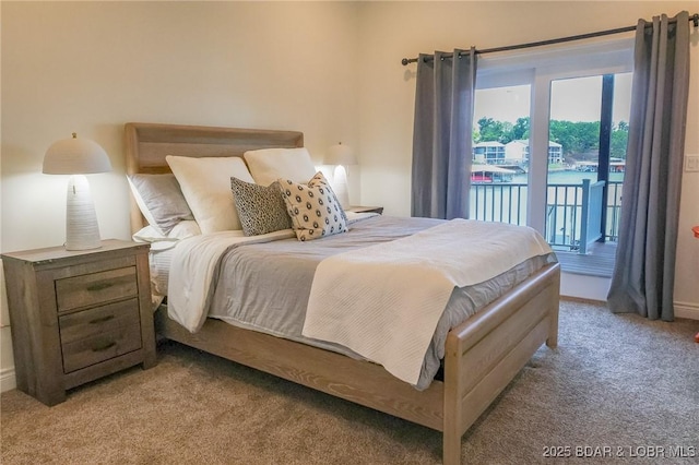 1484 Apple Blossom Cir, Osage Beach, MO 65065 - bedroom with light carpet and access to outside