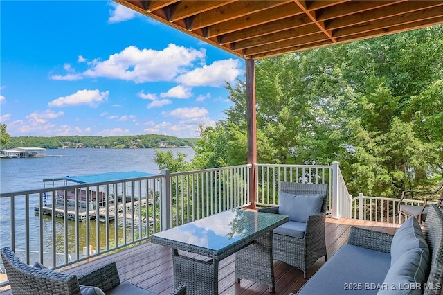 wooden terrace with a water view