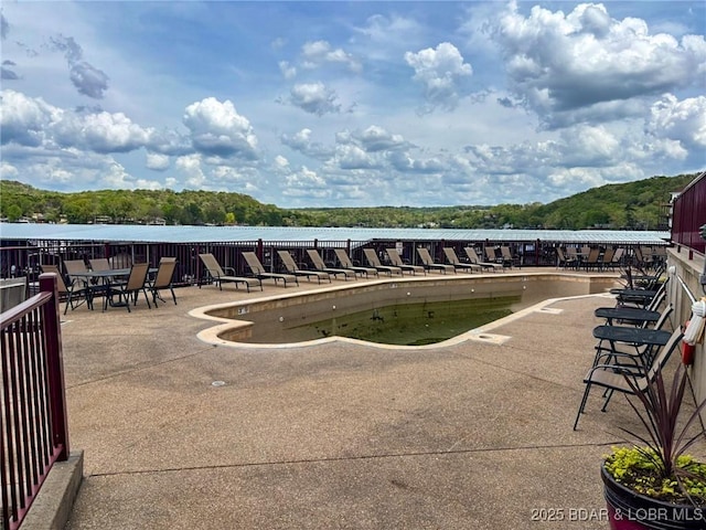768 Clearwater Dr Unit 2-A, Camdenton, MO 65020 - view of swimming pool with a patio area and a water view