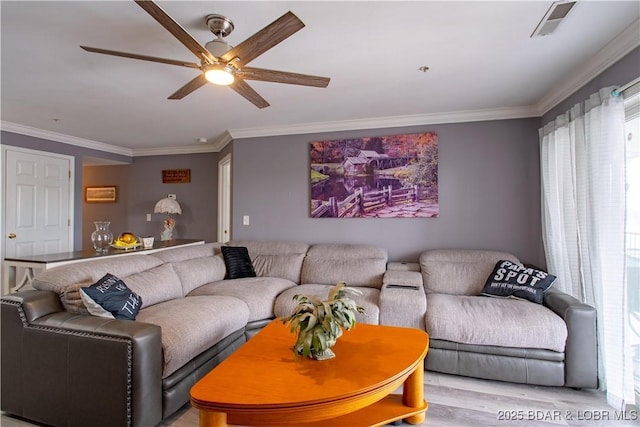 768 Clearwater Dr Unit 2-A, Camdenton, MO 65020 - living room featuring a ceiling fan, ornamental molding, and wood finished floors