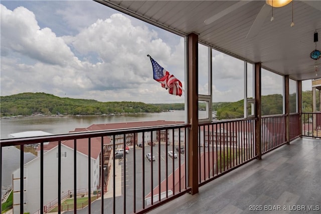 768 Clearwater Dr Unit 2-A, Camdenton, MO 65020 - unfurnished sunroom with a water view
