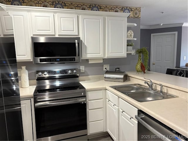 768 Clearwater Dr Unit 2-A, Camdenton, MO 65020 - kitchen with stainless steel appliances, white cabinetry, light countertops, open shelves, and ornamental molding