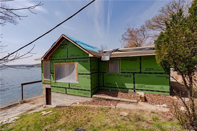 29540 Inspiration Pt, Rocky Mount, MO 65072 - view of home's exterior featuring a water view