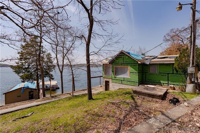 29540 Inspiration Pt, Rocky Mount, MO 65072 - view of yard with an outbuilding and a water view