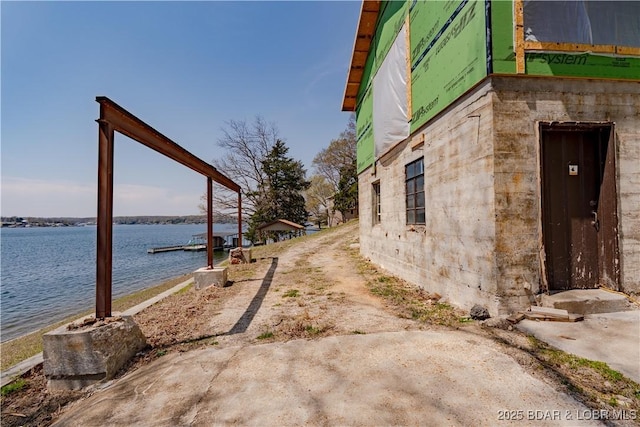 29540 Inspiration Pt, Rocky Mount, MO 65072 - view of side of property with a water view