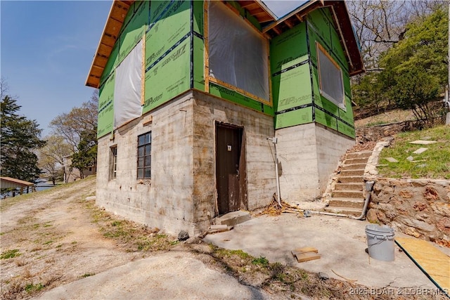 29540 Inspiration Pt, Rocky Mount, MO 65072 - view of side of home featuring stairway
