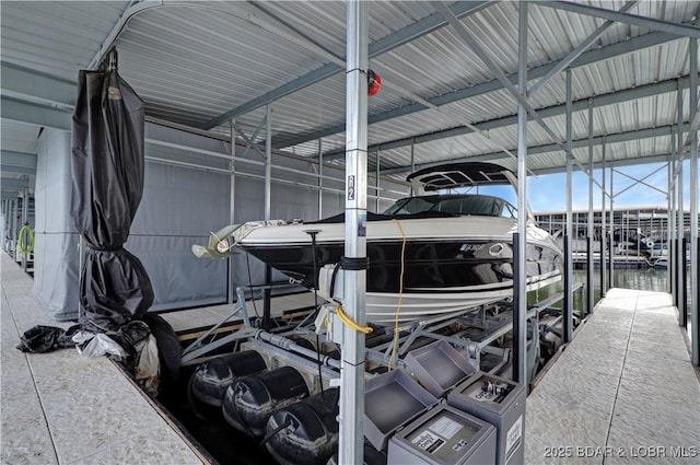 166 Captiva Dr Unit 5B, Sunrise Beach, MO 65079 - dock area with a water view and boat lift