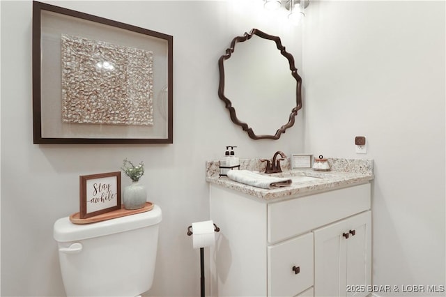 166 Captiva Dr Unit 5B, Sunrise Beach, MO 65079 - bathroom featuring vanity and toilet