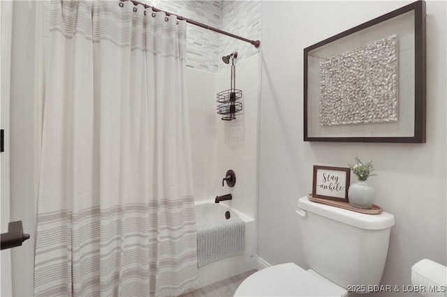 166 Captiva Dr Unit 5B, Sunrise Beach, MO 65079 - full bathroom featuring shower / bath combo with shower curtain and toilet