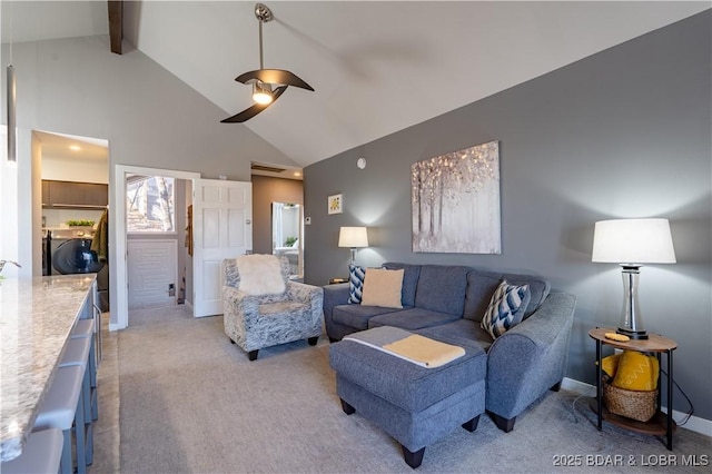 56 Treasure Cay, Osage Beach, MO 65065 - living area with light carpet, high vaulted ceiling, beamed ceiling, ceiling fan, and baseboards