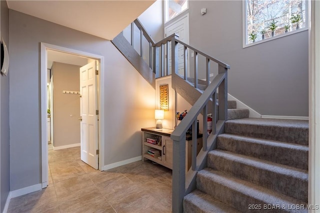 56 Treasure Cay, Osage Beach, MO 65065 - stairway featuring baseboards