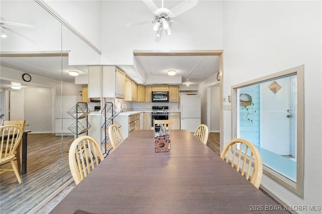 18 Trail Rd, Eldon, MO 65026 - dining space featuring baseboards, a ceiling fan, and light wood finished floors