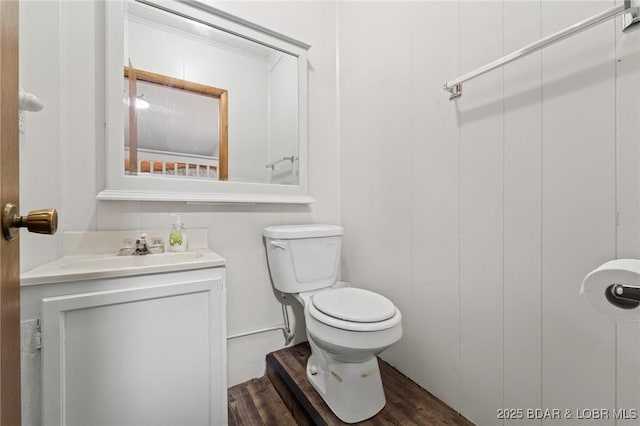 18 Trail Rd, Eldon, MO 65026 - bathroom featuring toilet, wood finished floors, and vanity
