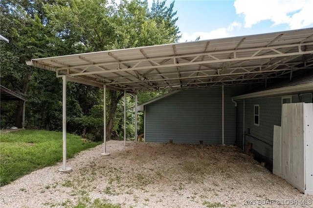 18 Trail Rd, Eldon, MO 65026 - view of parking featuring a carport