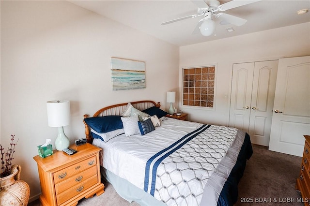 carpeted bedroom with a closet, ceiling fan, and visible vents