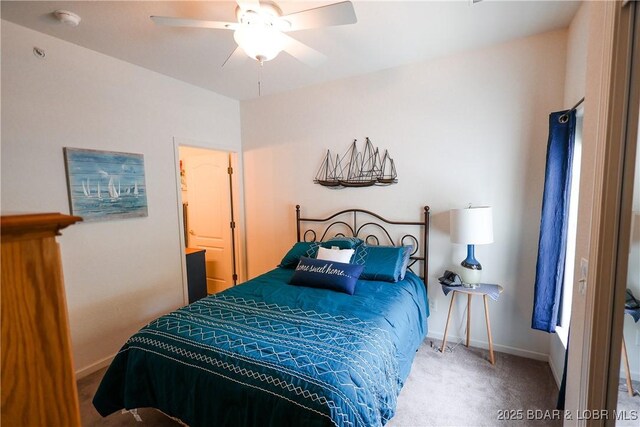 bedroom with baseboards, ceiling fan, and carpet flooring