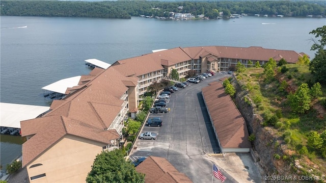 birds eye view of property featuring a water view