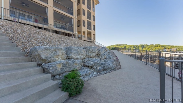 view of community featuring stairway