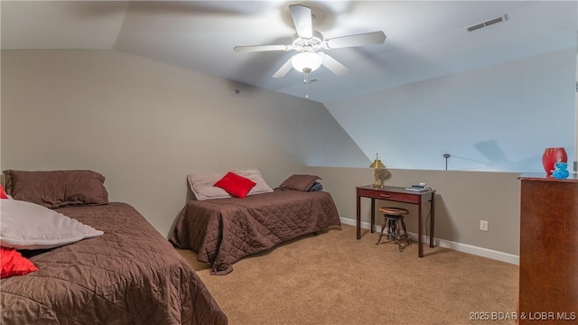 bedroom with carpet floors, a ceiling fan, vaulted ceiling, and visible vents